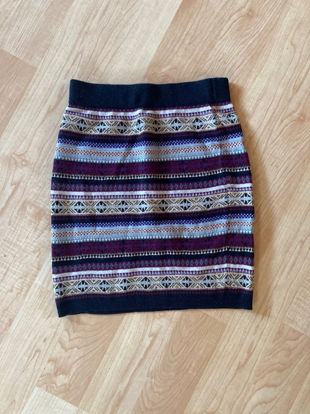 2 fitted stretch mini skirts